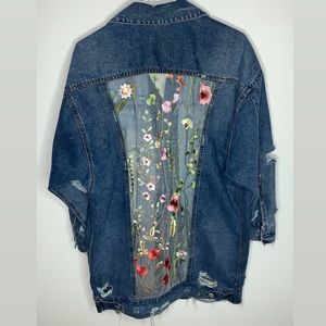 Handmade mesh flower embroidered jean jacket .